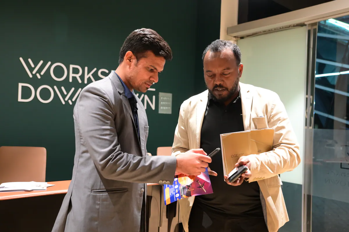 Two founders reviewing practical business information together