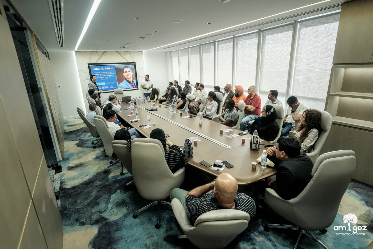 Founders gathered around a premium boardroom table