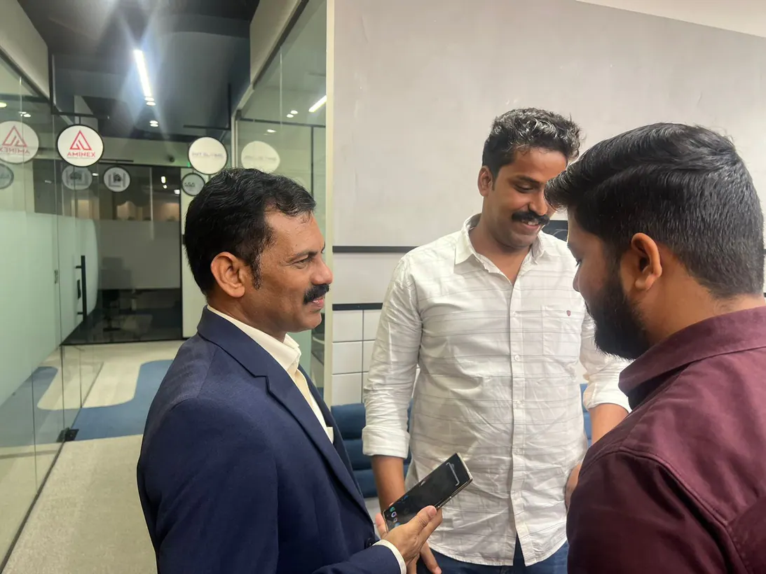 Business leaders speaking during a relaxed networking gathering